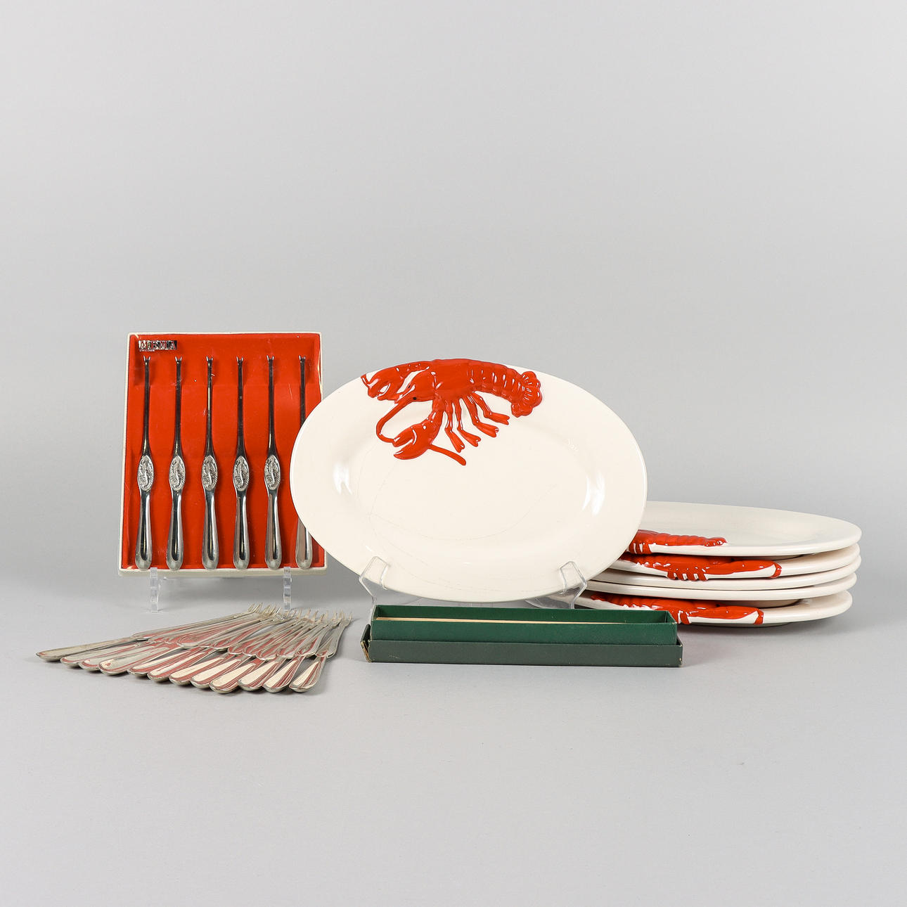 CRAYFISH PLATES AND SEAFOOD CUTLERY.