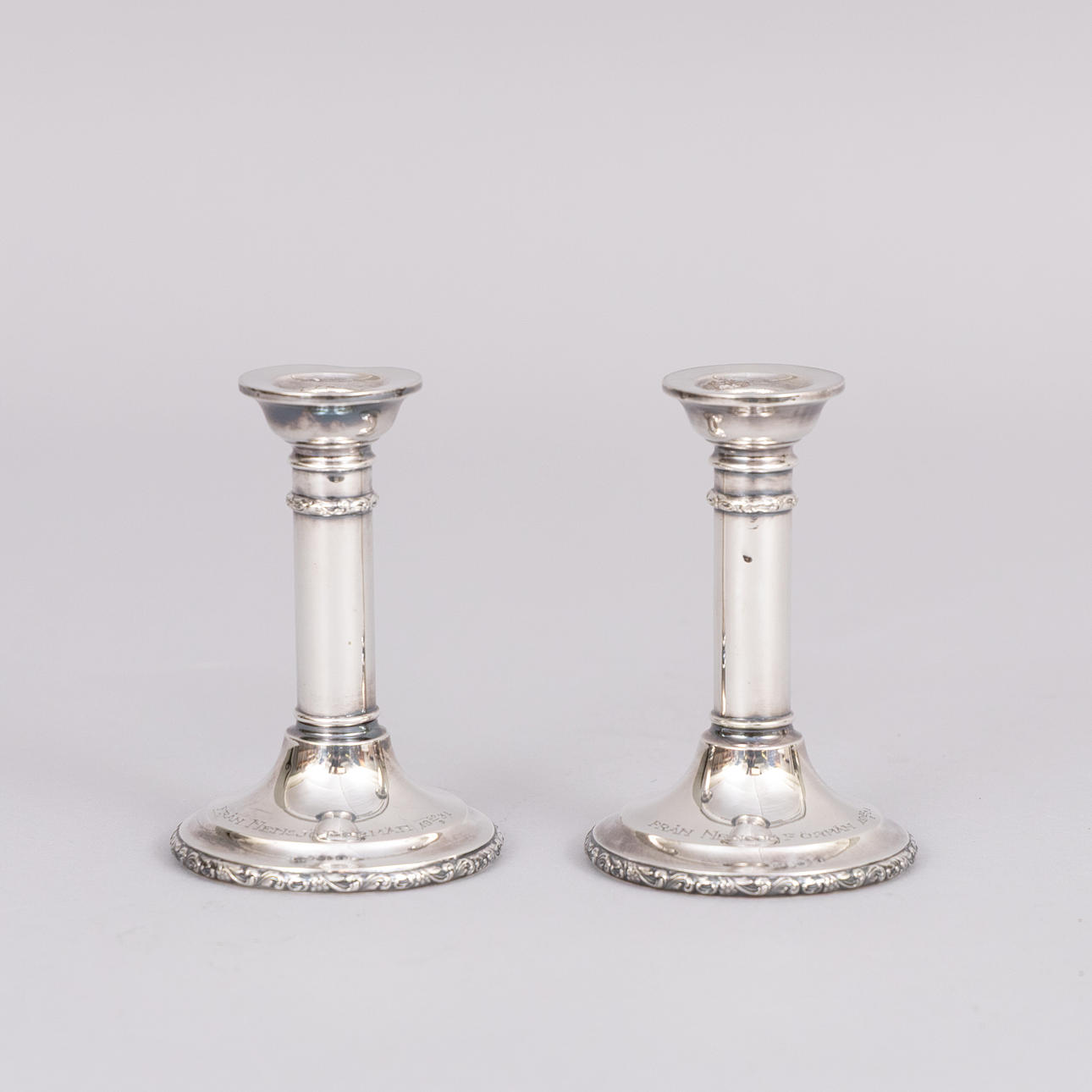 A pair of silver candlesticks, Wahlbergs Guldsmedsaffär G Wahlbe Härnösand.