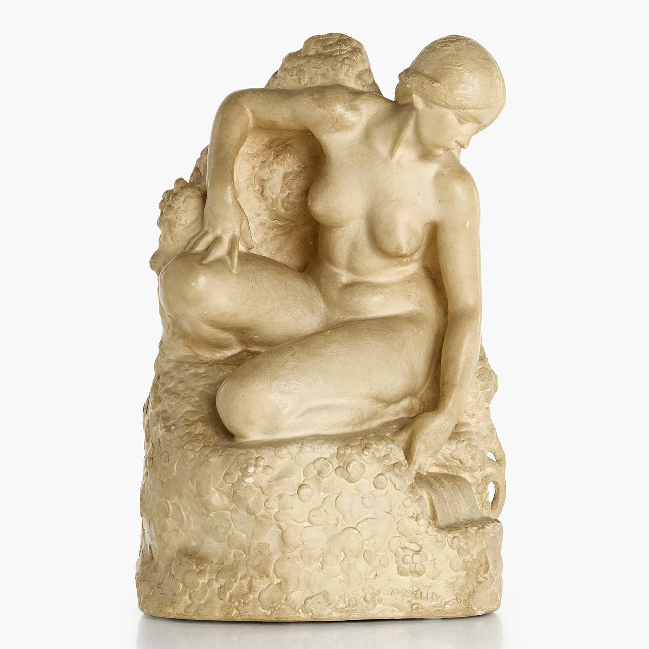HERMAN NEUJD (1872-1931). At the source, signed H-Neujd, patinated plaster.