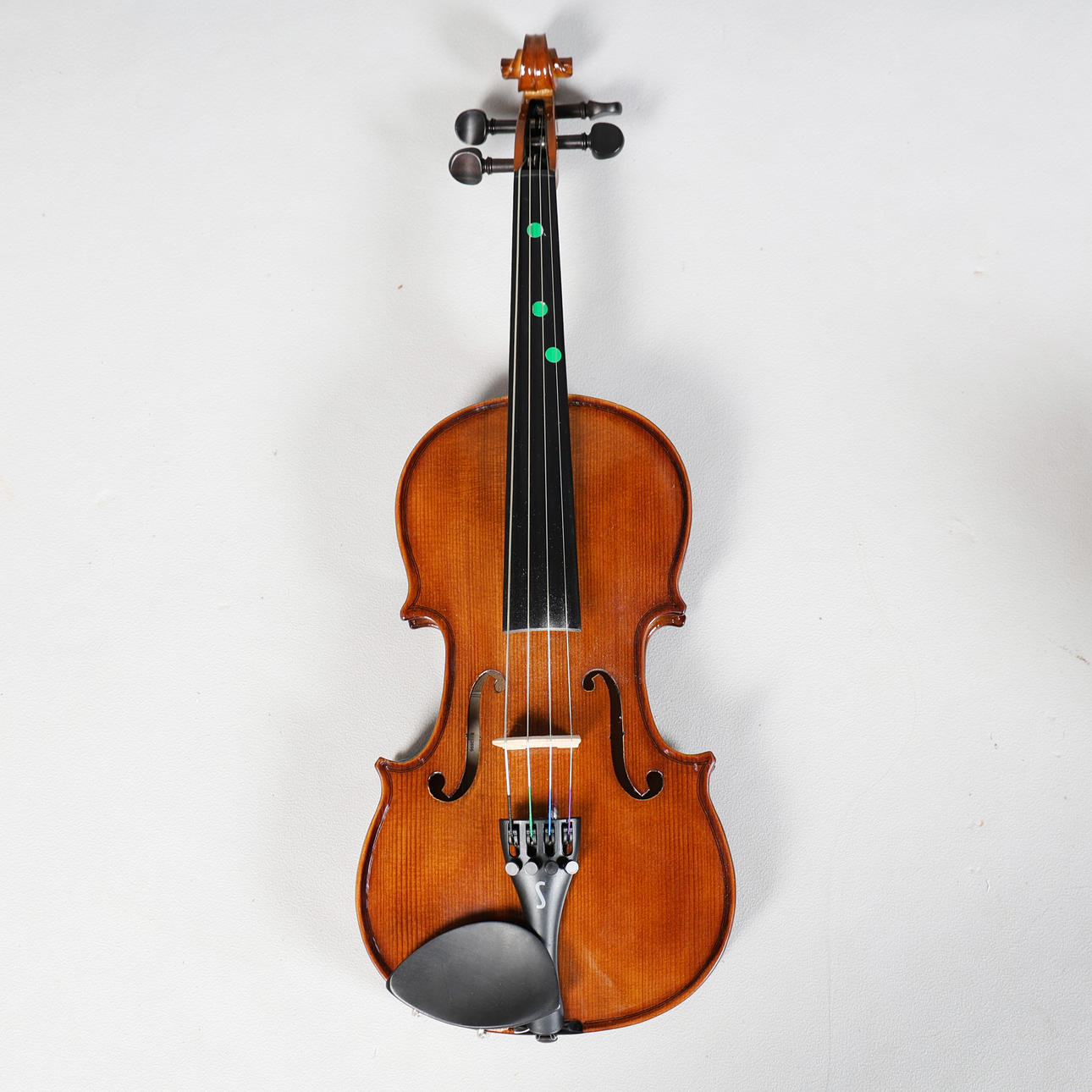 A CASED 1/2 VIOLA AND BOW.