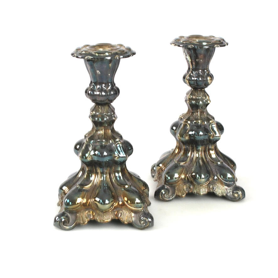 A pair of nickel silver candlesticks.