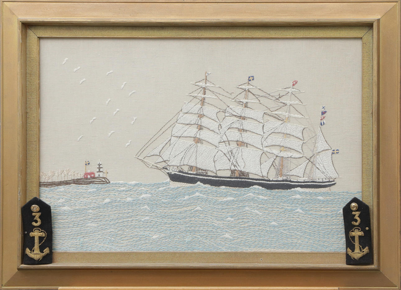 An embroidered ship board, 20th century.