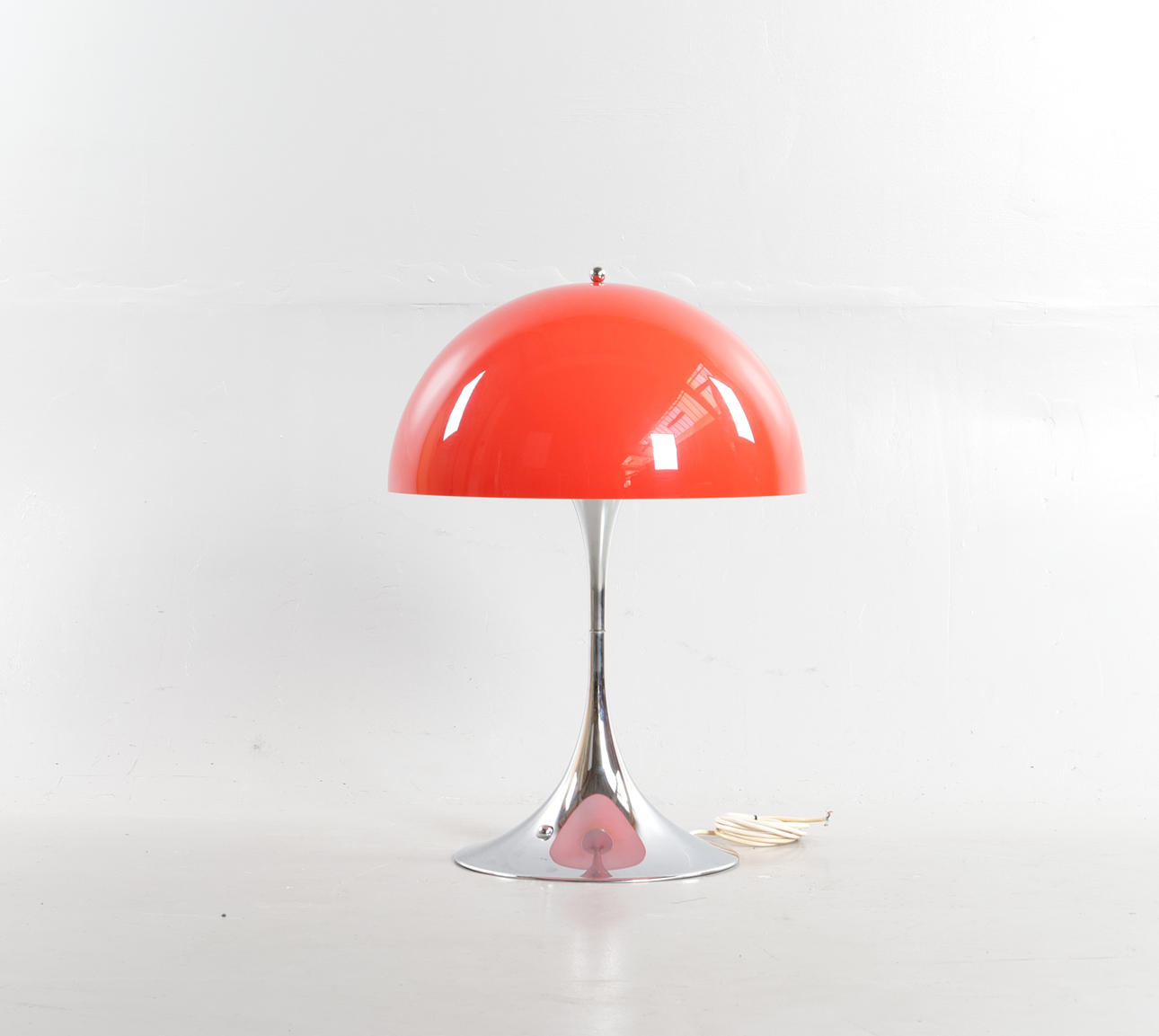 VERNER PANTON. “Panthella”, table lamp with chrome-plated base, shade of orange acrylic. Designed in 1971. Made and branded at Louis Poulsen.