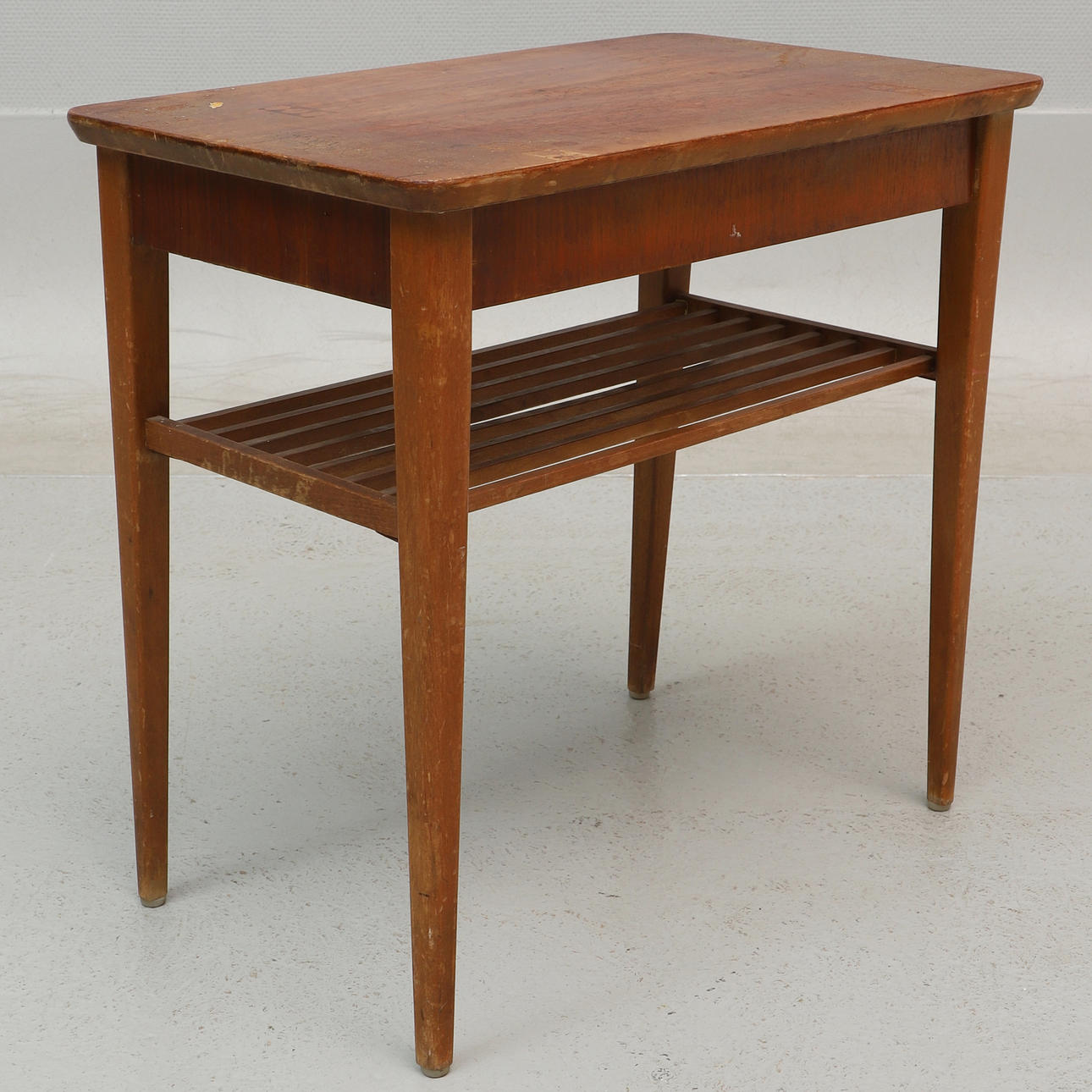A 1950's teak bedside table, box and newspaper shelf.
