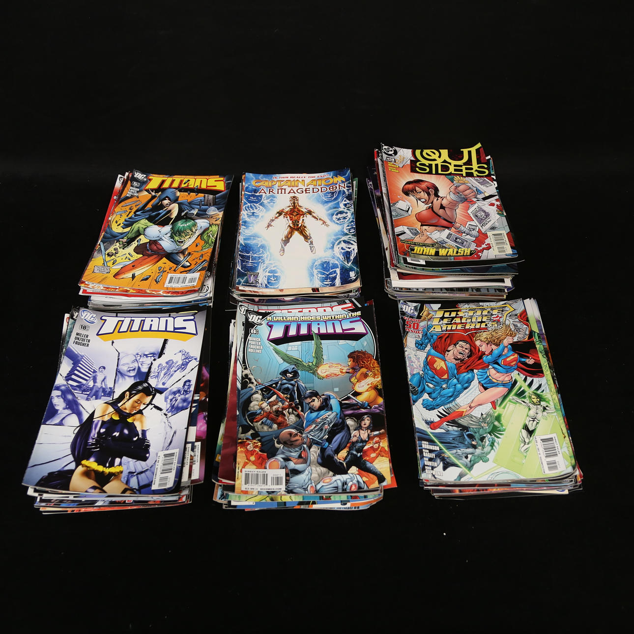 COMIC BOOKS, including Titans, Out siders.