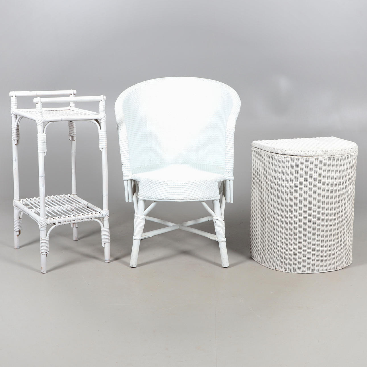 A LLOYD LOOM WHITE LINEN BASKET ETC.