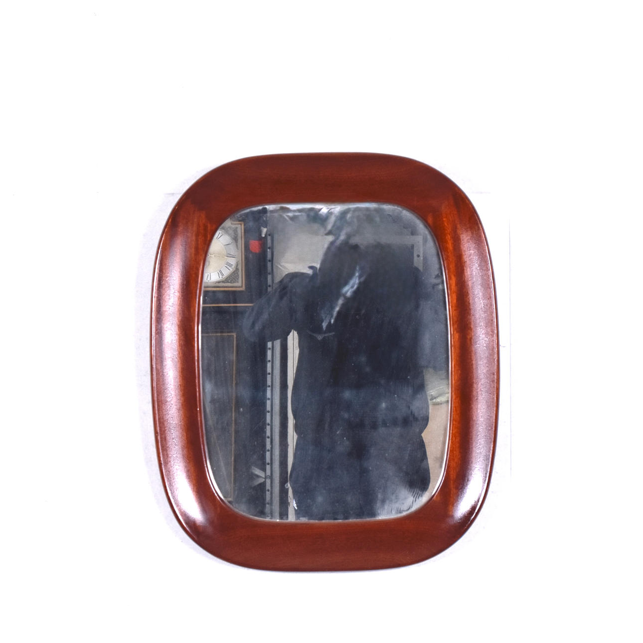 A 20th century mahogany mirror.