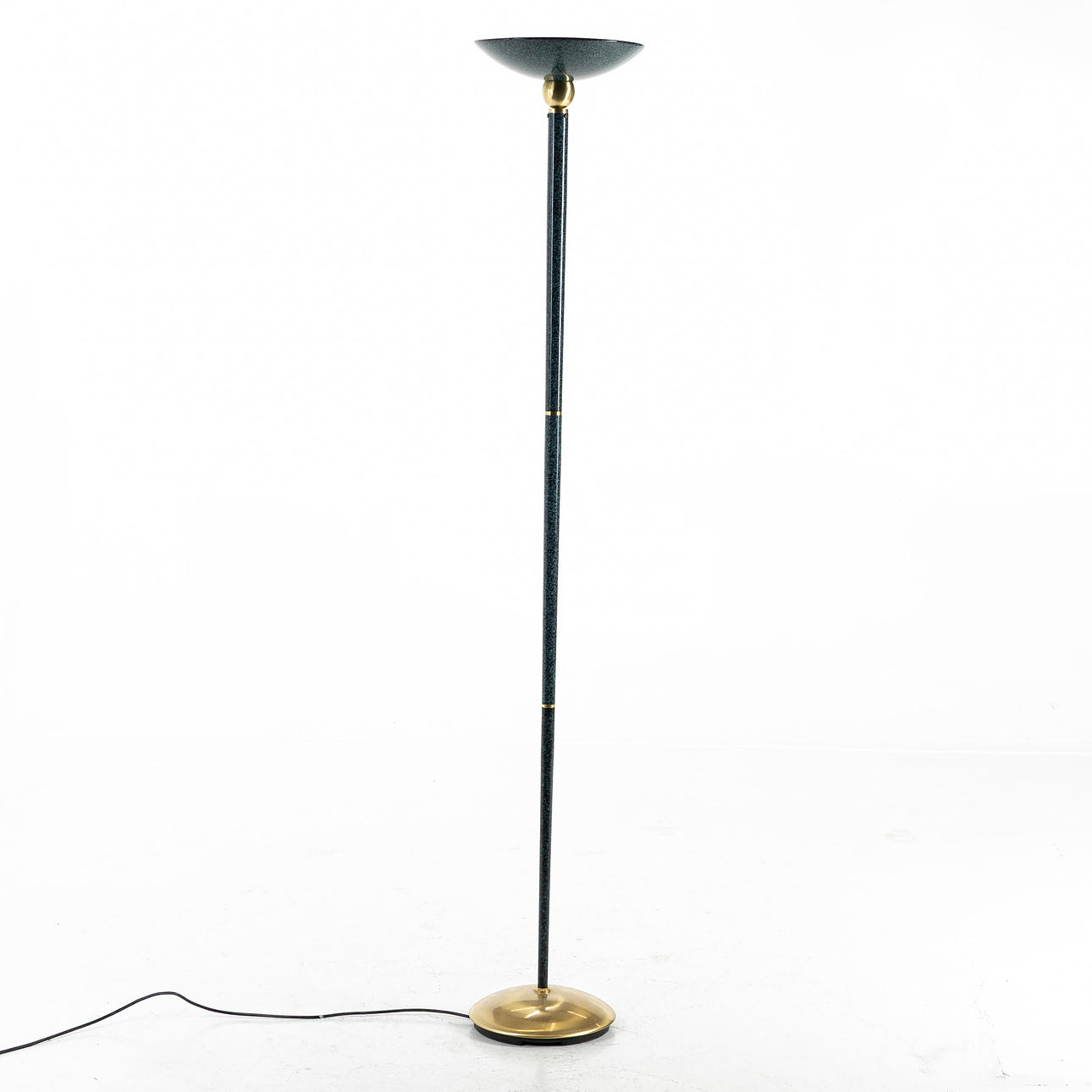 A late 20th century uplight floor lamp.