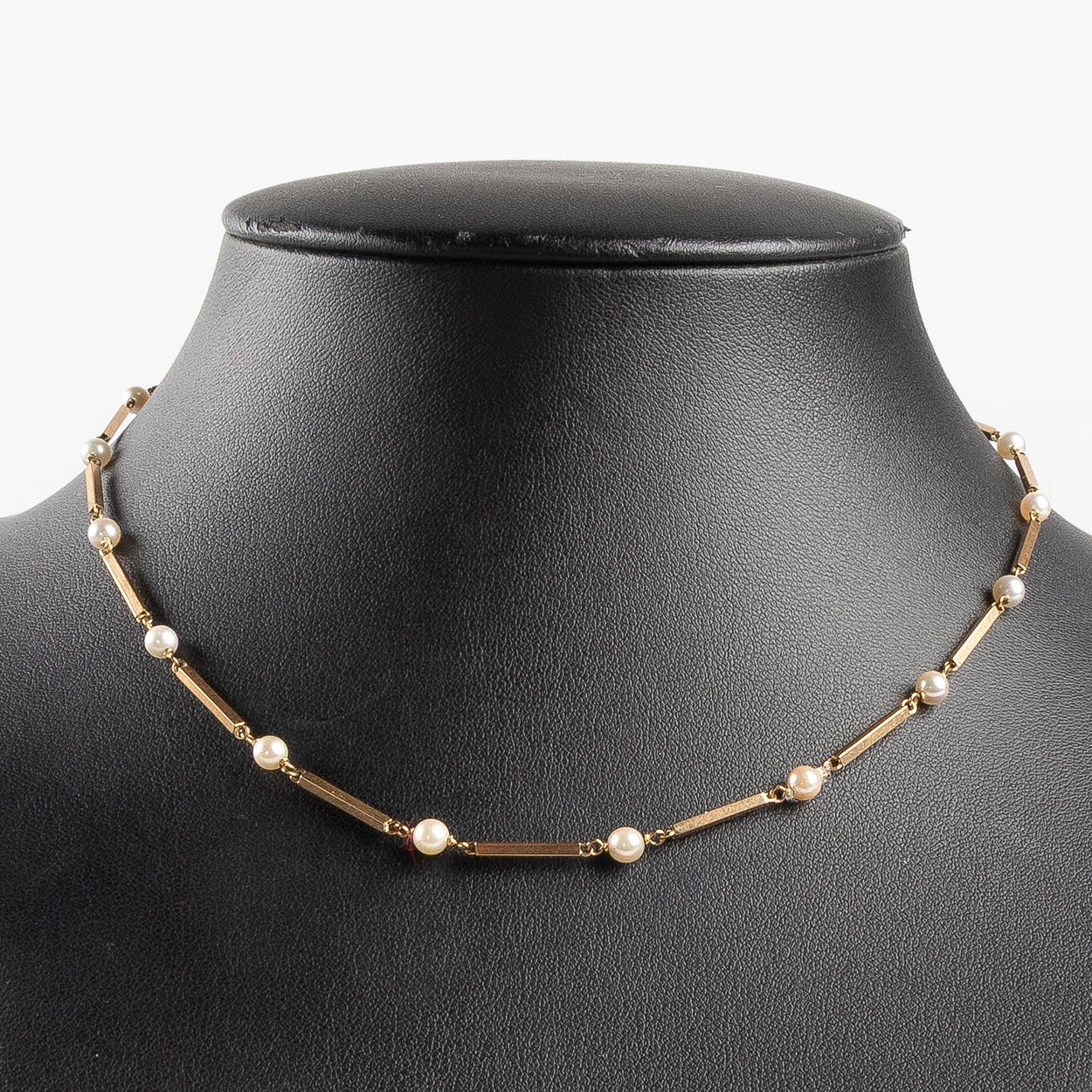 COLLIER OCH ARMBAND, 18K guld.