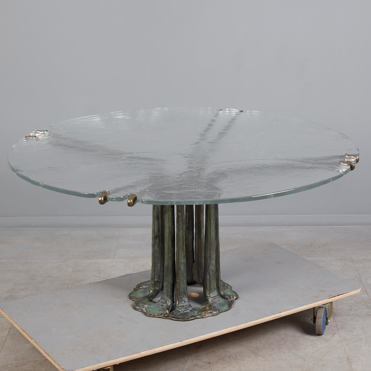 LOTHAR KLUTE (1946 - 2023). Brutalist table, bronze, glass, Germany.