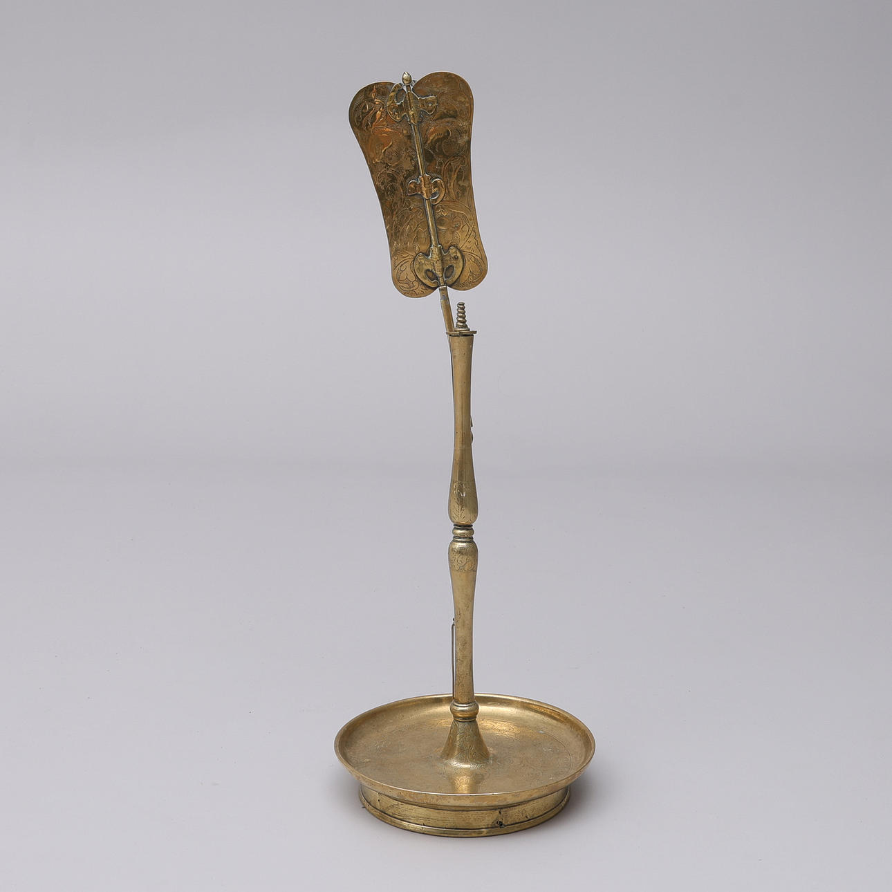CHINESE OR KOREAN BRASS CANDLESTICK, CIRCA 1900.