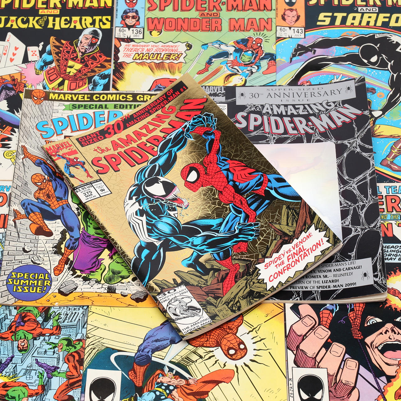 9 cómics, incluidos Marvel Team-Up, Spider-Man and the Mighty Thor, Human Torch, Captain Marvel, etc.