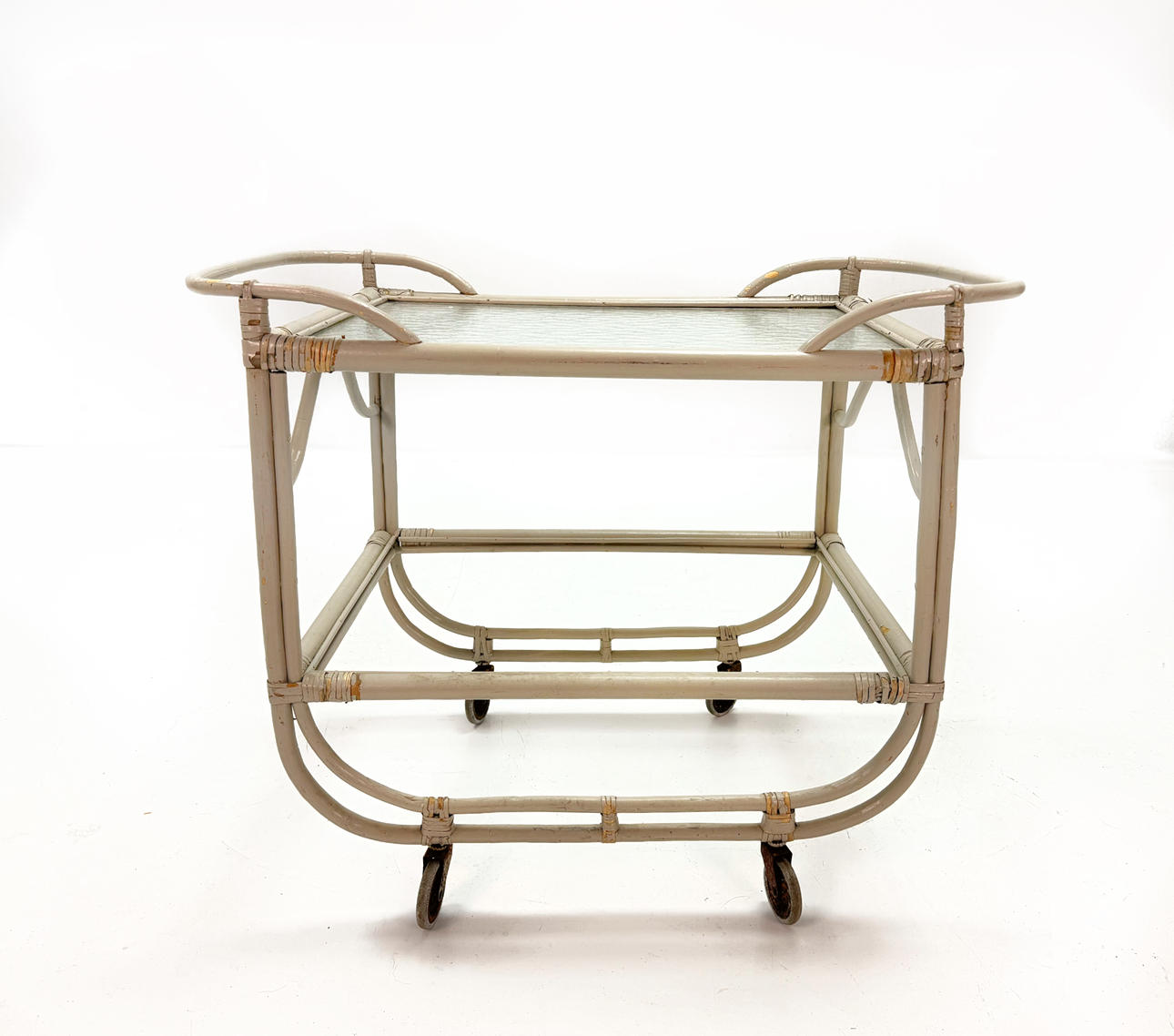 SERVING TROLLEY - Rattan with glass top.