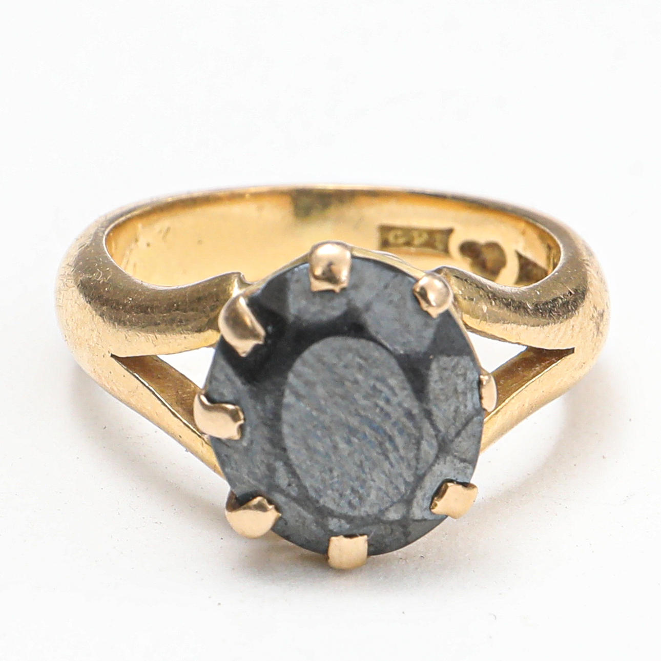 RING, 20 Karat Gold mit Stein, Gewicht ca. 7,1 Gramm.