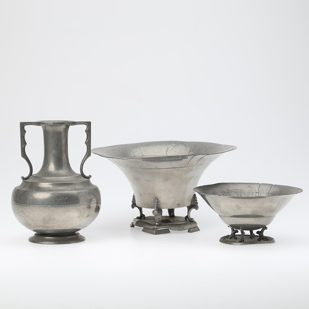 A collection of pewter objects, bowls and vase, Svenskt Tenn, Sweden, first half of the 20th century (3).