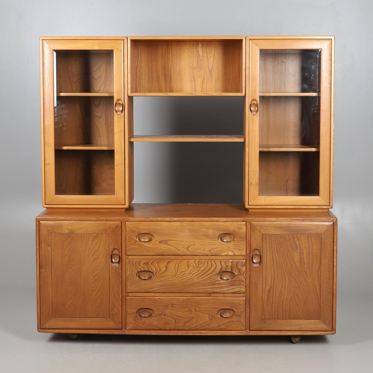 MID CENTURY ERCOL SIDEBOARD & DISPLAY CABINET.