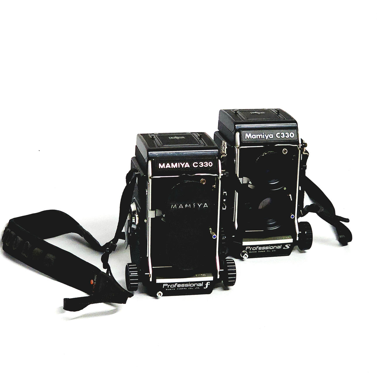 Two Mamiya C330 film cameras.