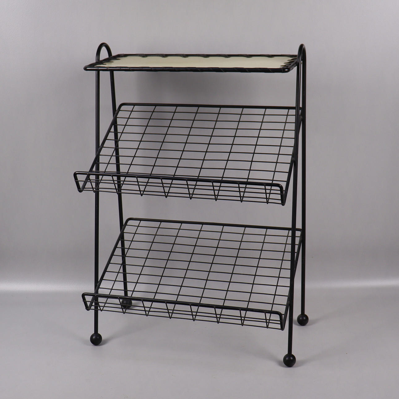 TIDNINGSSTÄLL, metall, string-modell, 1950/60-tal.