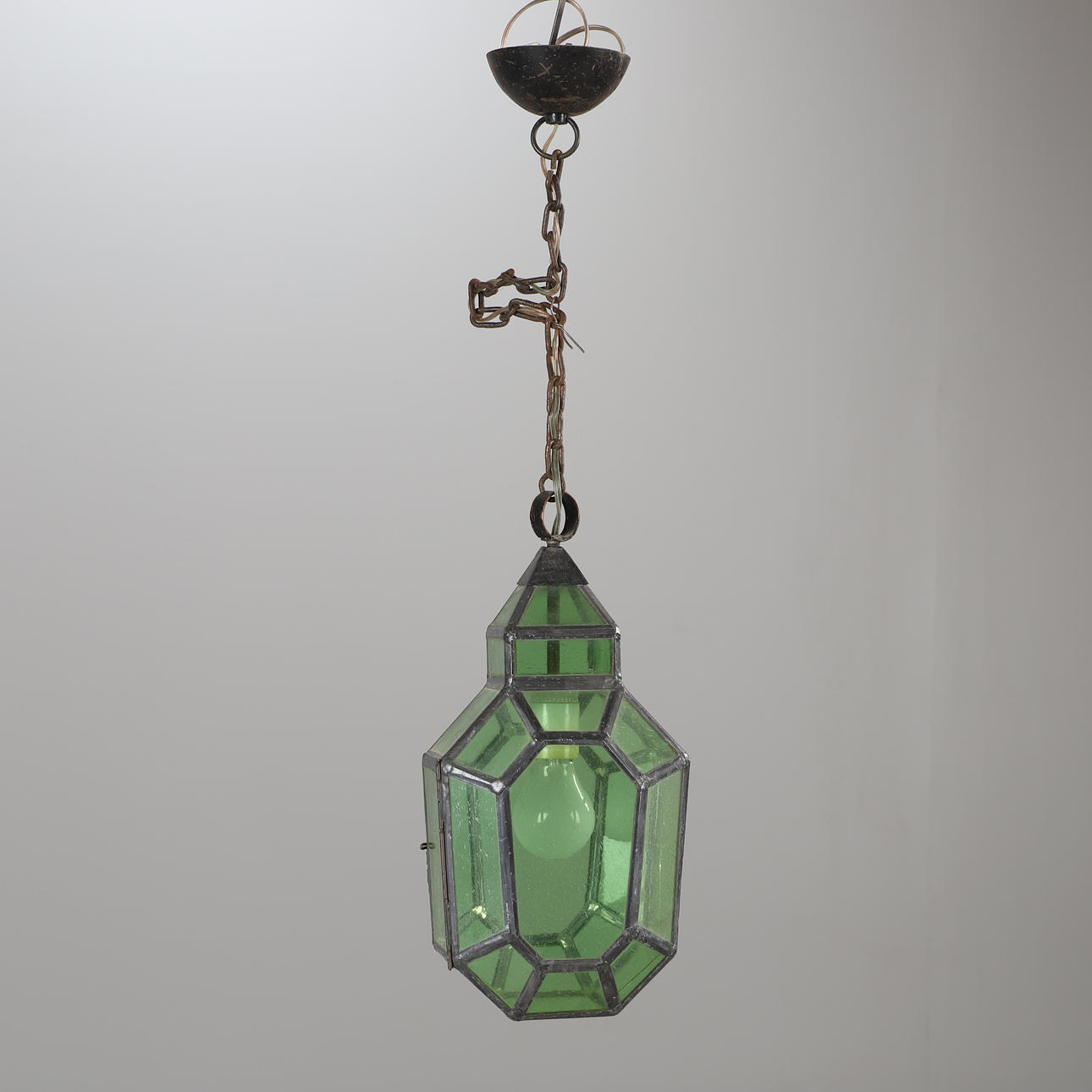 A 20th-century stained glass ceiling lamp.