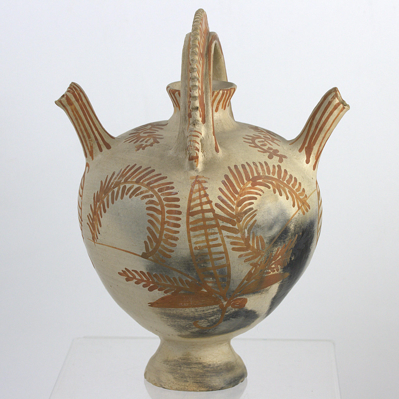 An earthenware decanter, richly decorated, Guatemala.