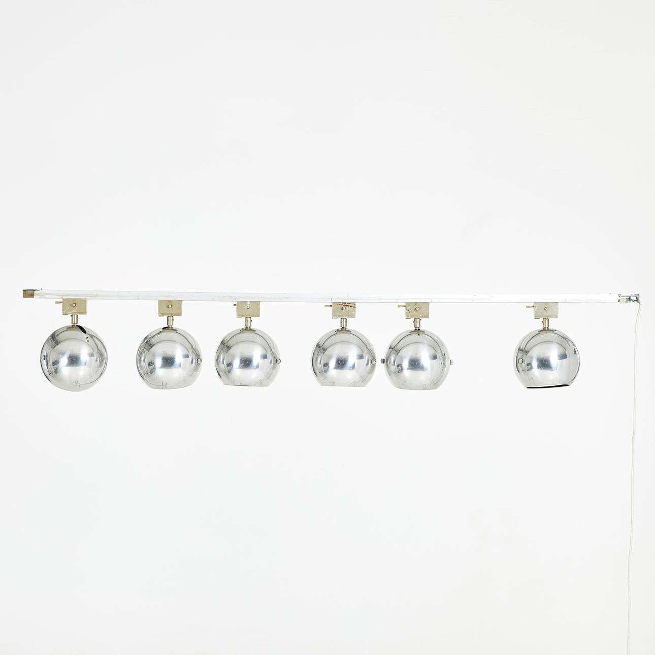 A set of six aluminium spotlights on rails, second half of the 20th century, Louis Poulsen, Denmark.
