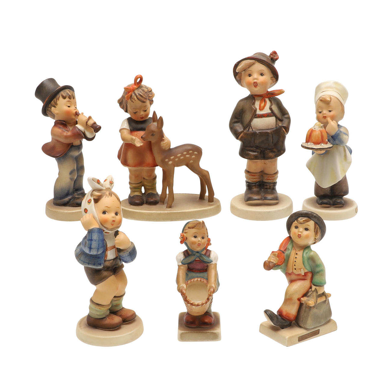 COLLECTION OF HUMMEL FIGURES.