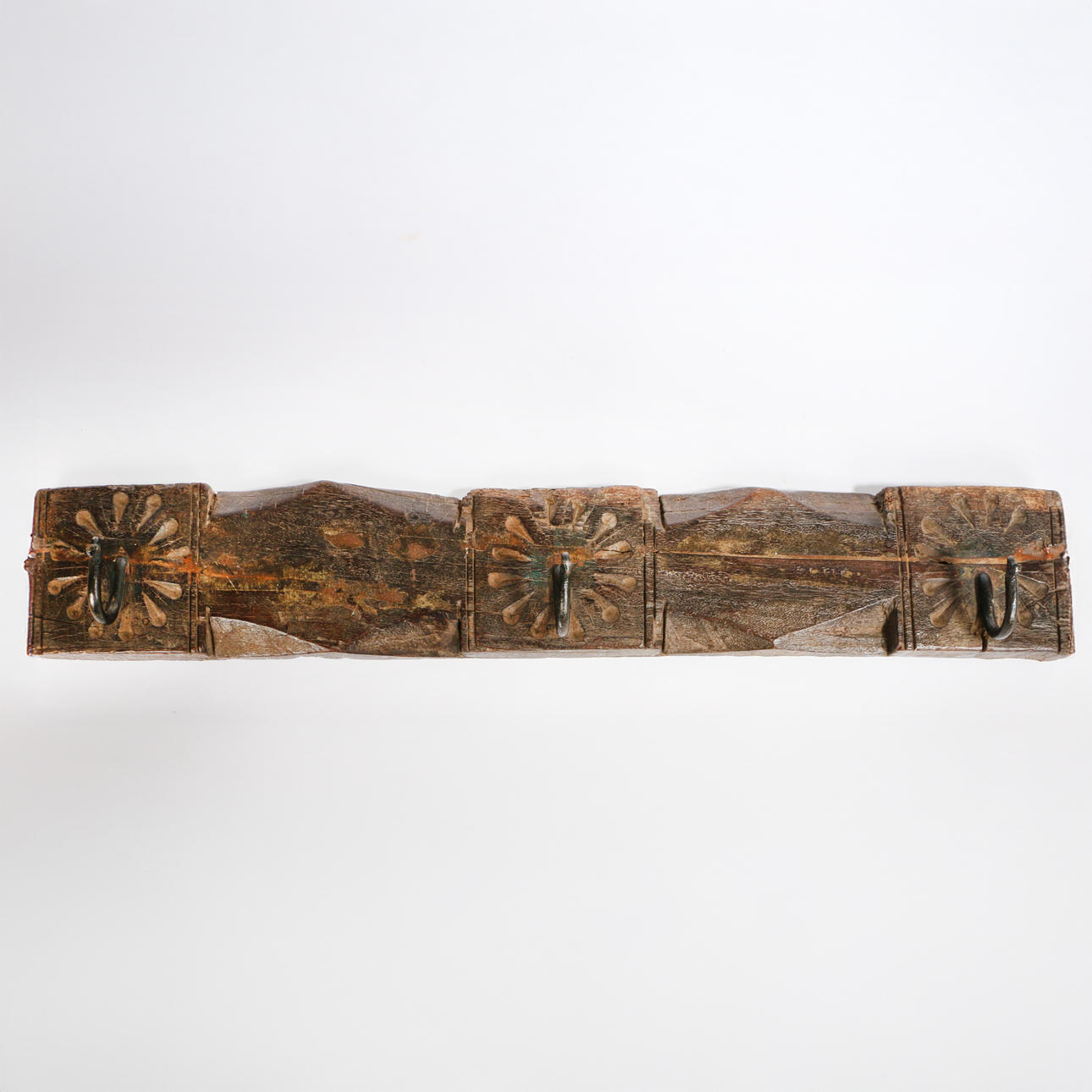 A 19TH CENTURY OAK HANGING GAME RACK.