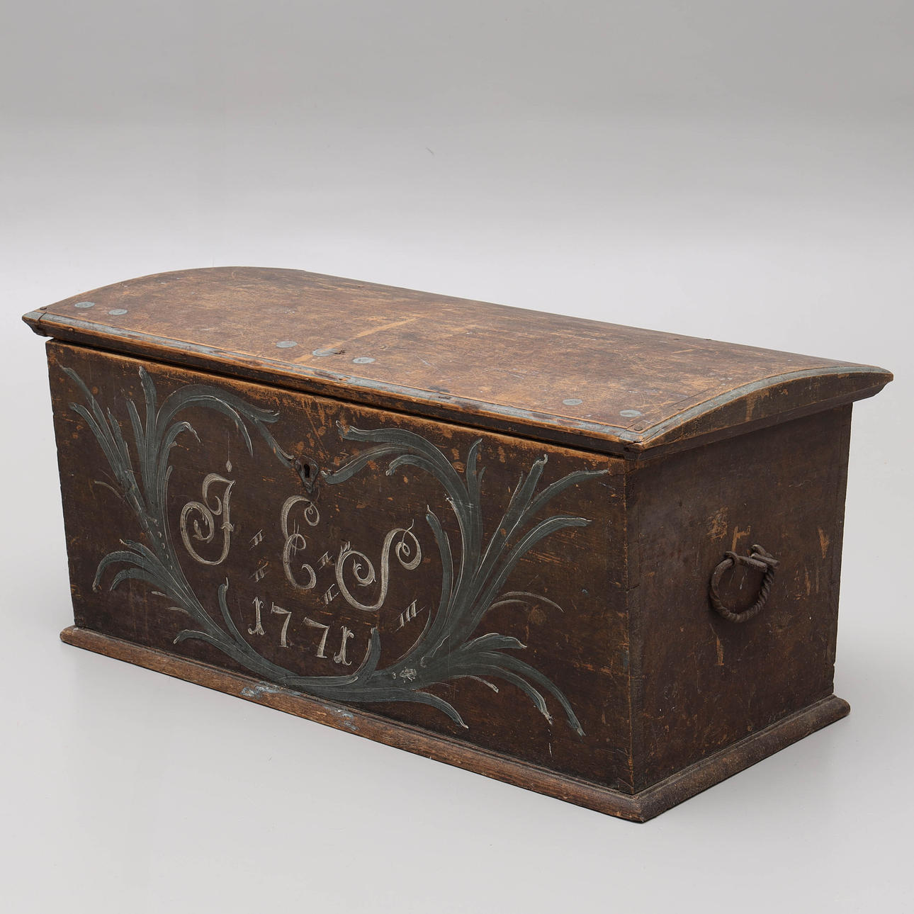 A chest of drawers, dated 1771.