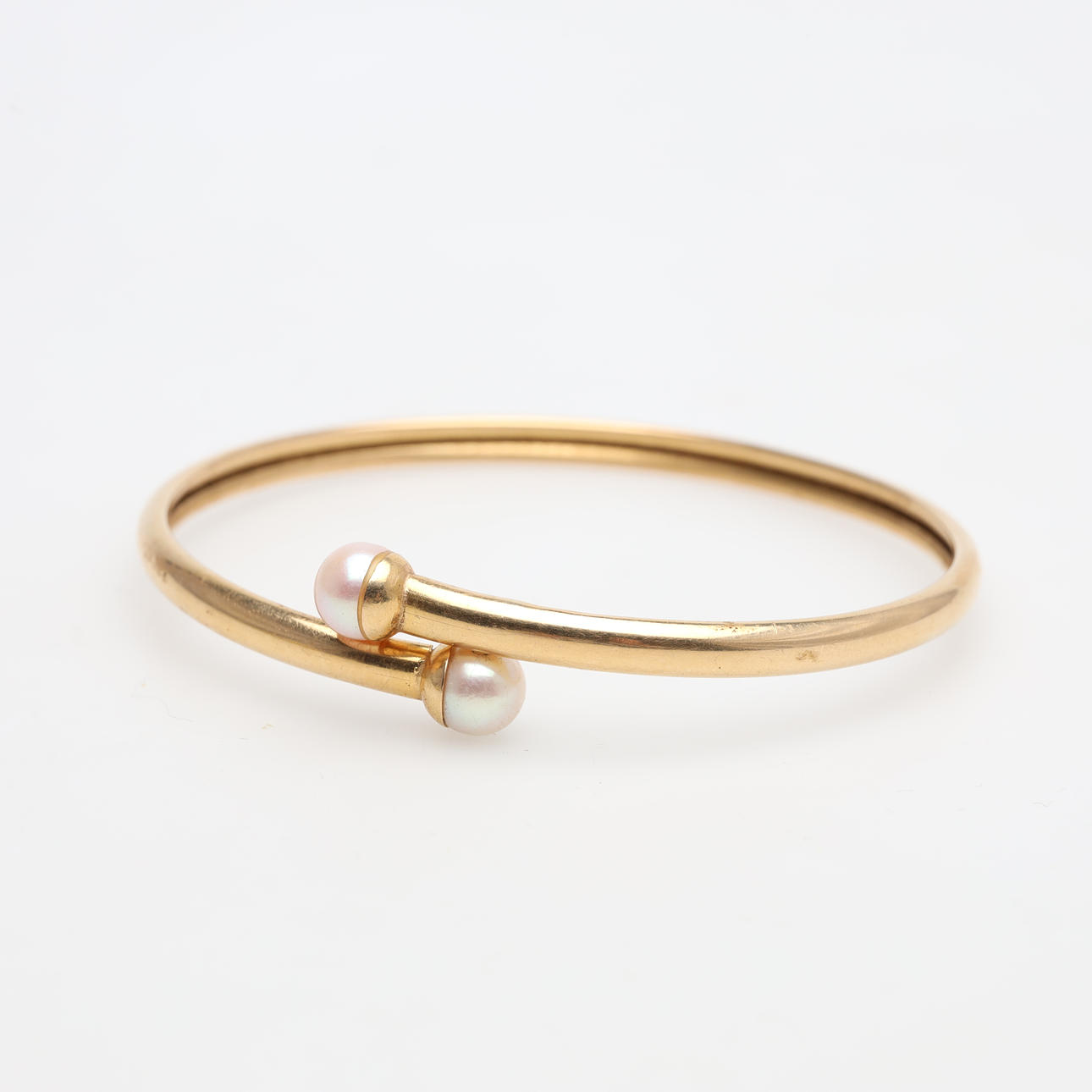 ARMRING 18K guld bruttovikt ca 10 gram.