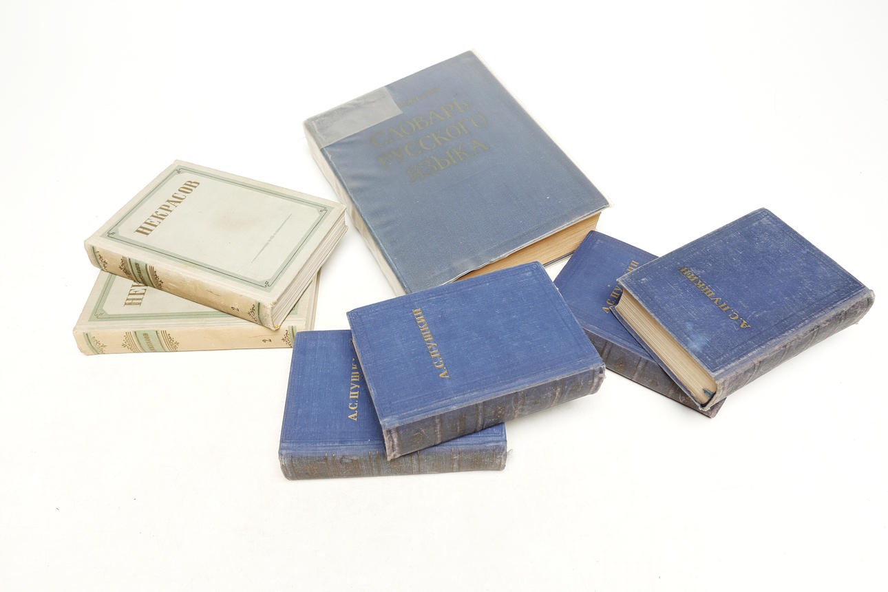 A set of 7 books, Cyrillic letters.