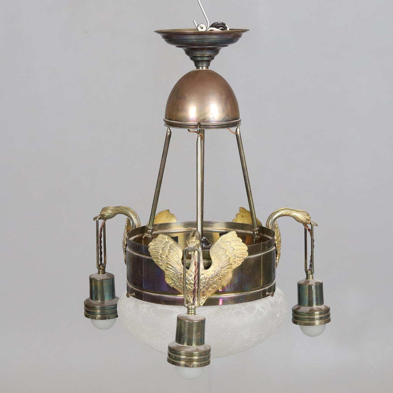 CEILING LAMP. Empirical style, brass with decorative swans, cup of frosted glass, circa 20th century.