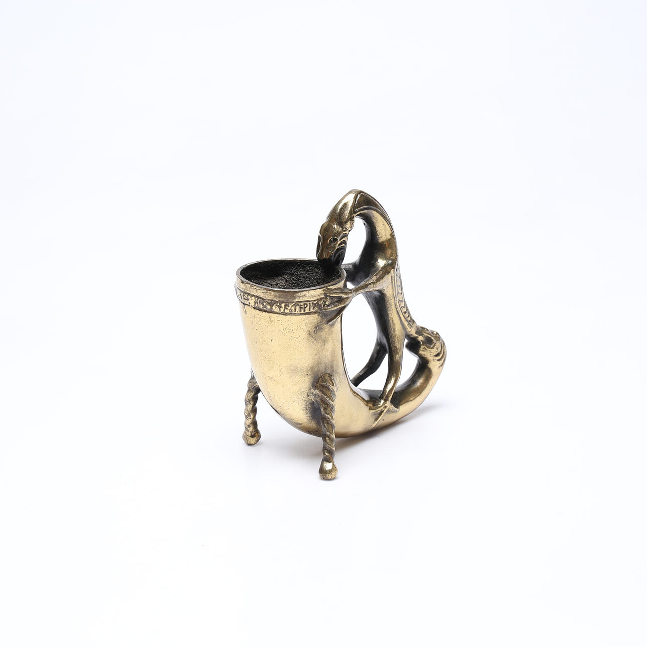 A brass drinking horn, Viking style, marked.