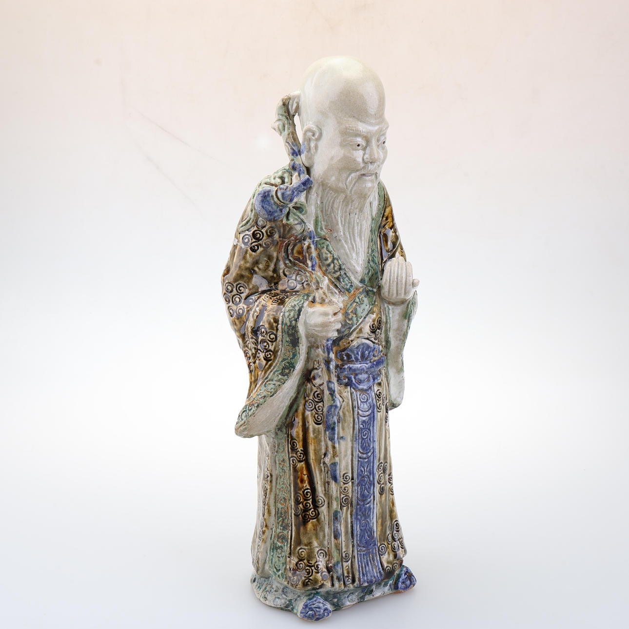 A Qing china earthenware figurine.