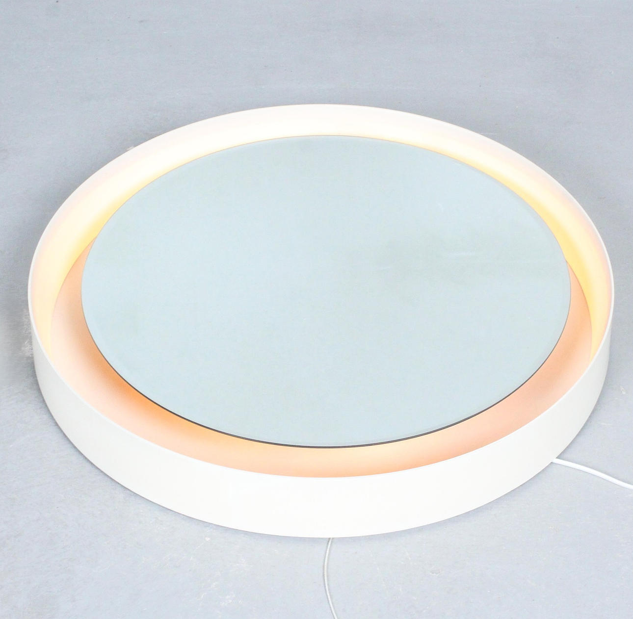 Illuminated mirror/wall mirror.