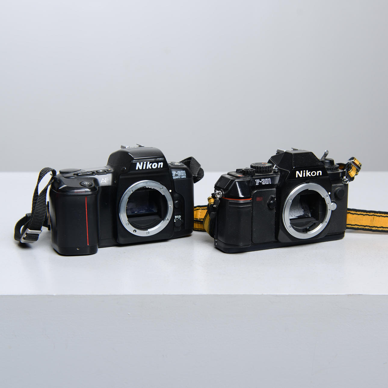 System cameras, 2 pcs, Nikon camera housing.