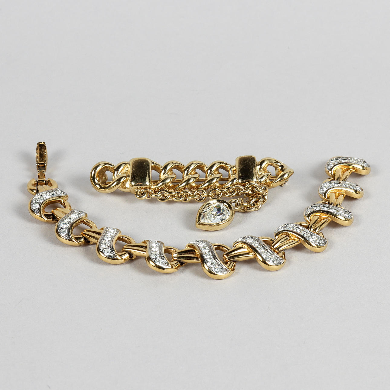 BRACELET AND BROOCH, Swarovski and Givenchy.