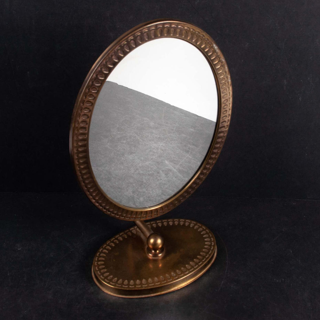 A mid-20th century Titti table mirror.