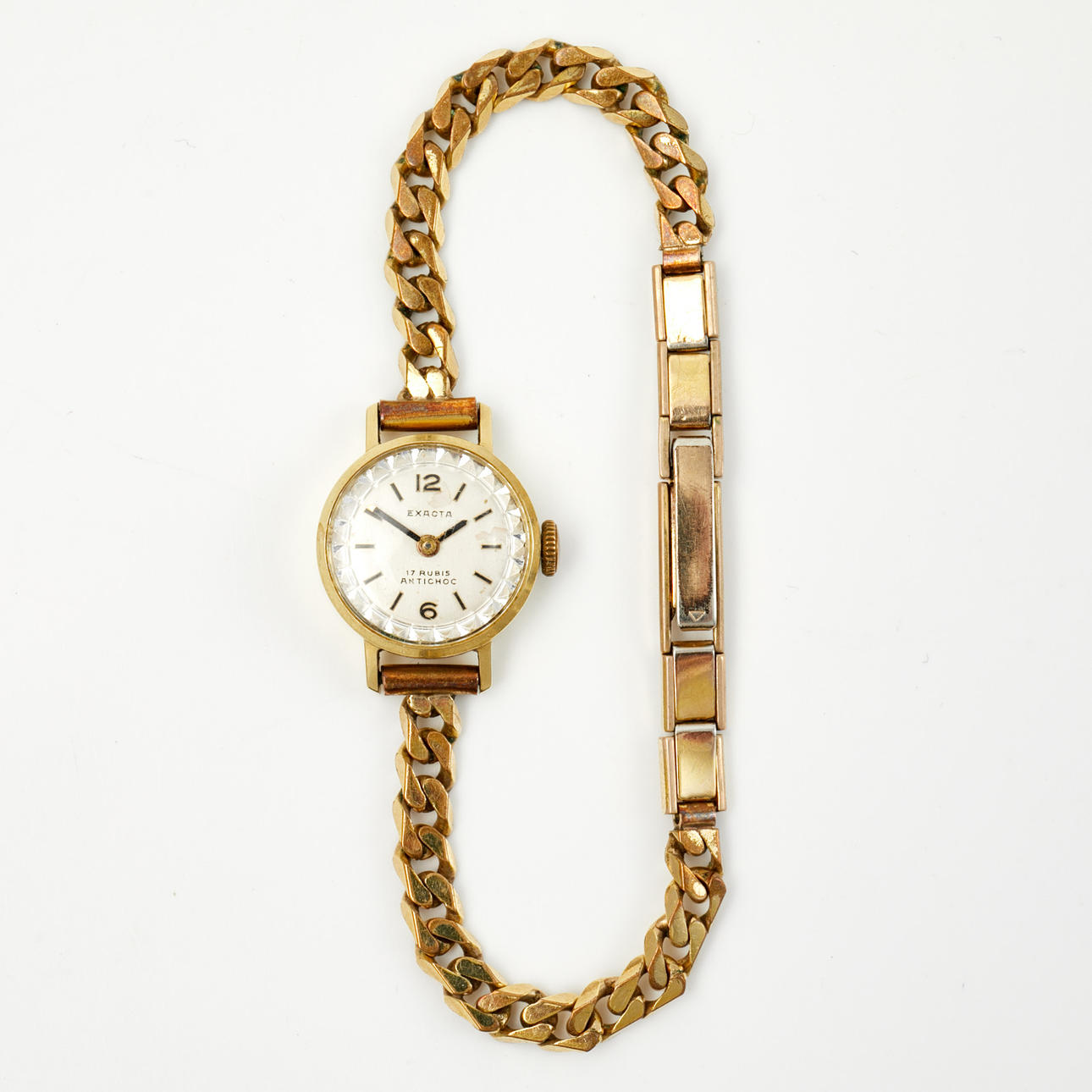 WRISTWATCH, Exacta, case in 14k gold, bracelet gilt, automatic clockwork.