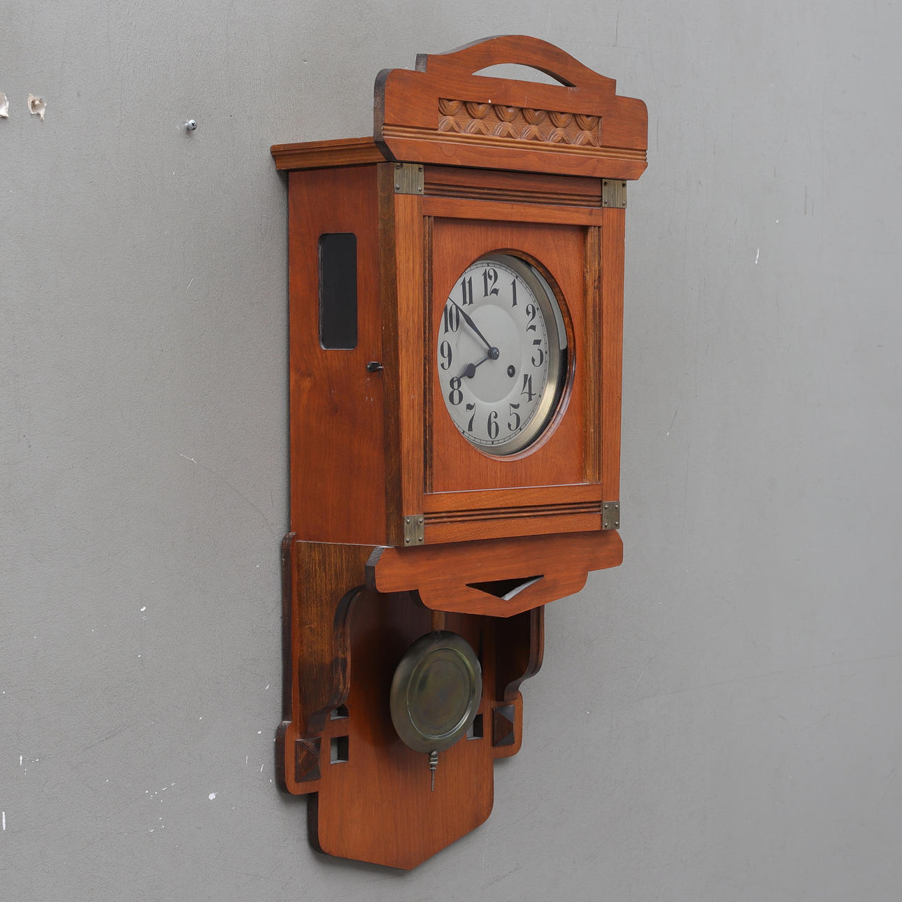 A Junghans wall clock, Jugend, Germany, early 20th century.