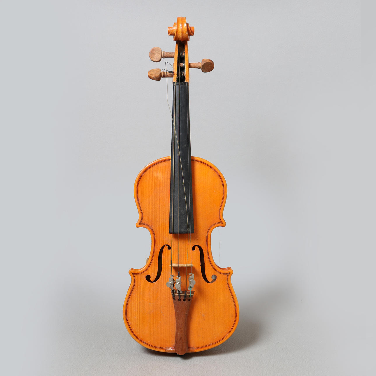 A CASED STENTOR 1/16 VIOLIN.
