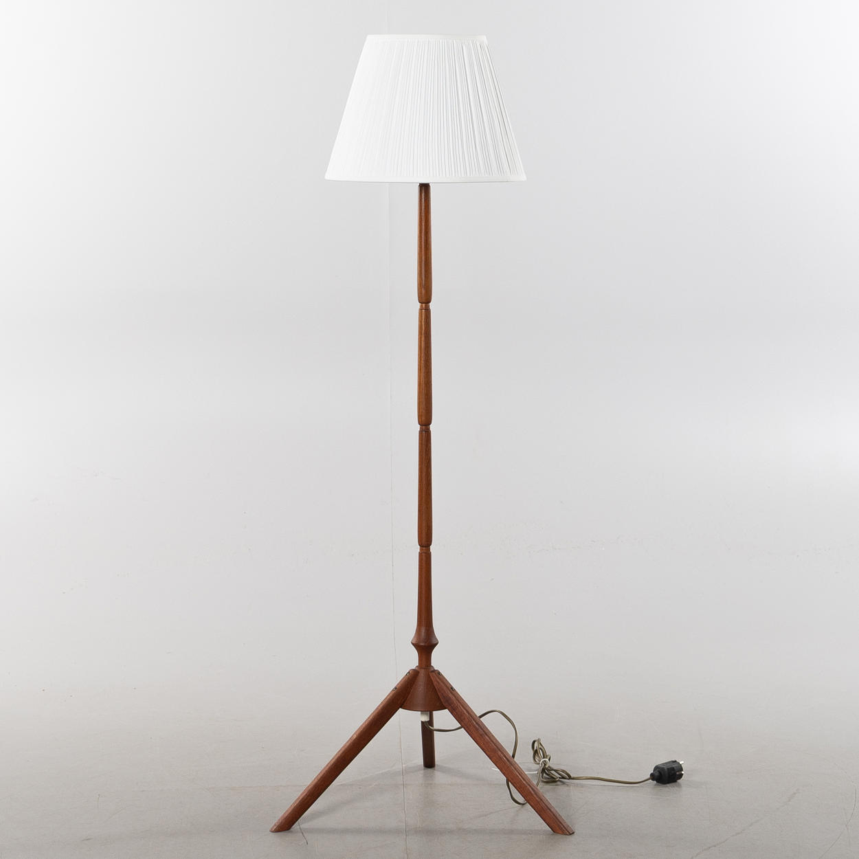 A teak floor lamp, 1960s.