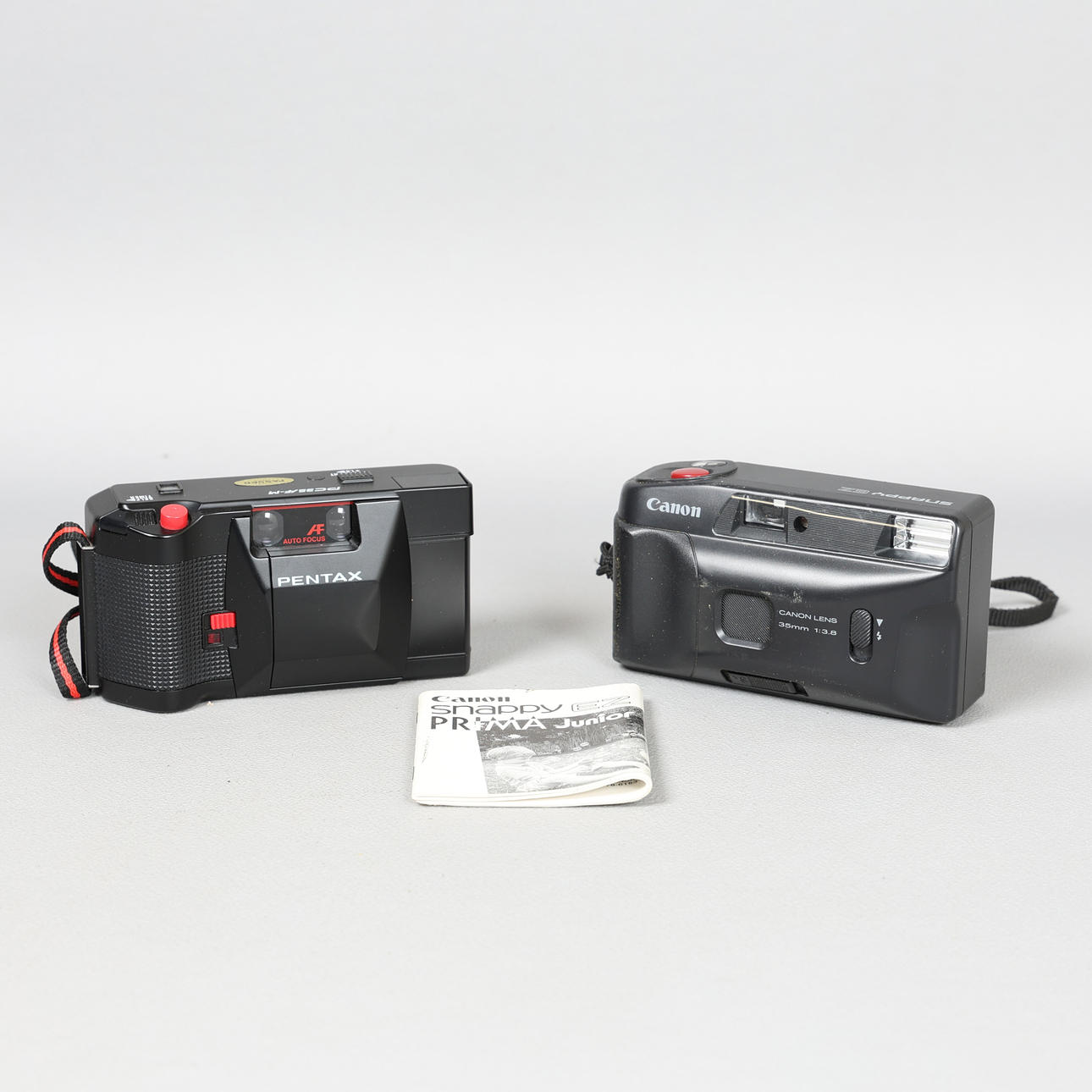 TWO 35MM COMPACT CAMERAS (2).