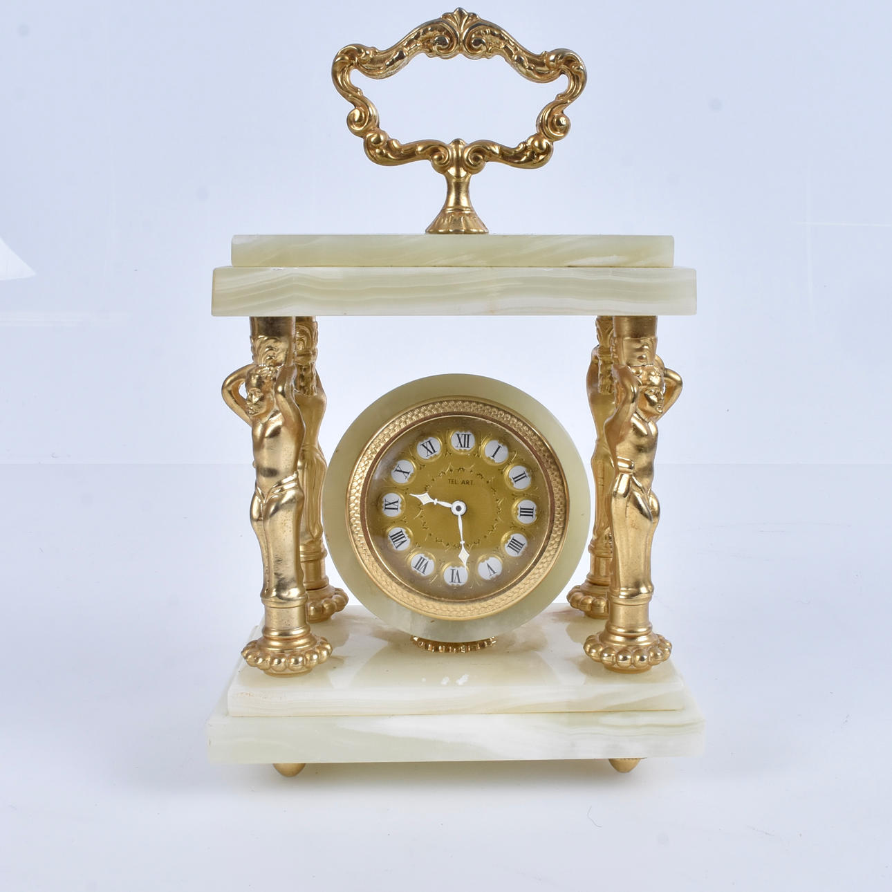 A 20th century brass marble table clock.