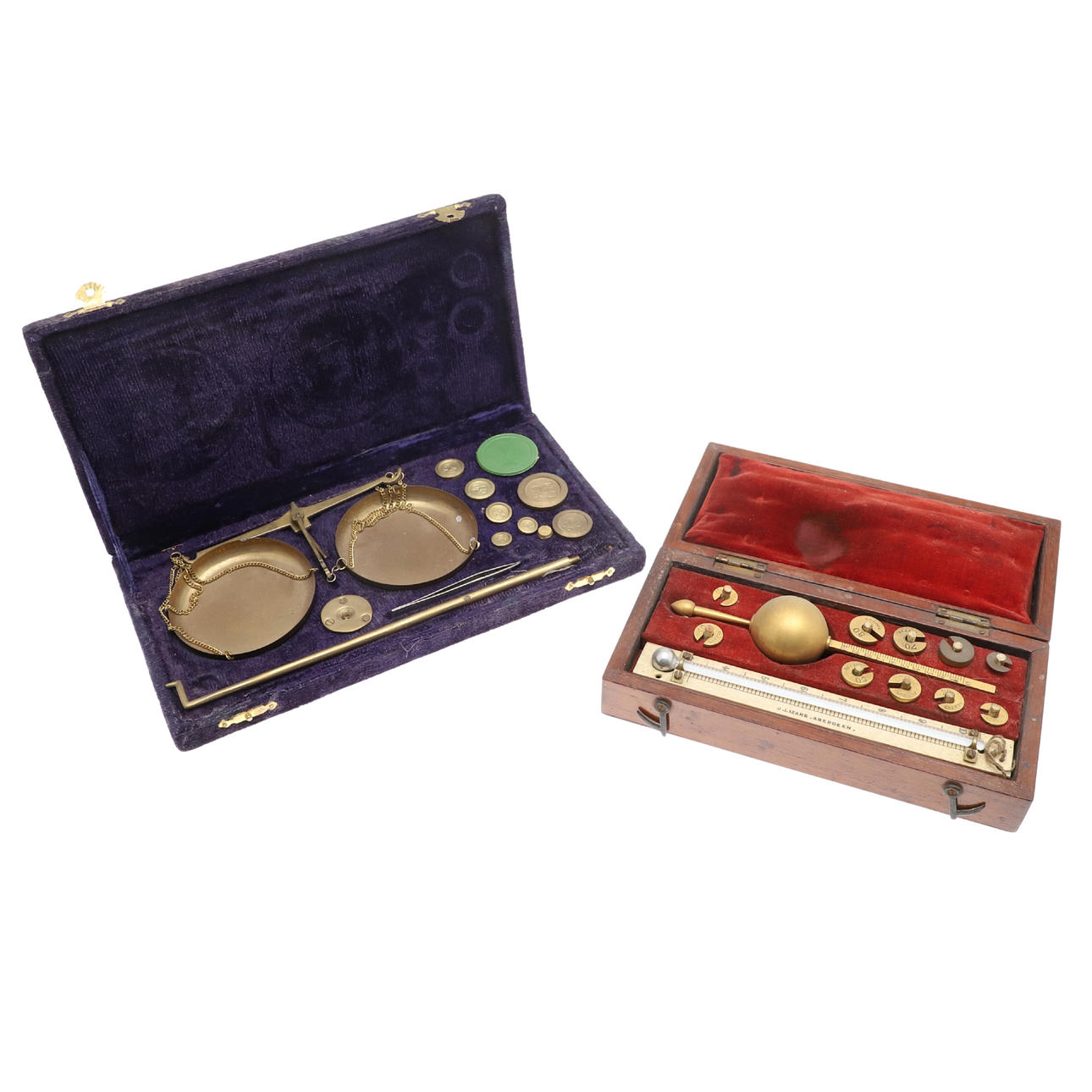 A SYKES HYDROMETER DONE AND PAN BALANCE.