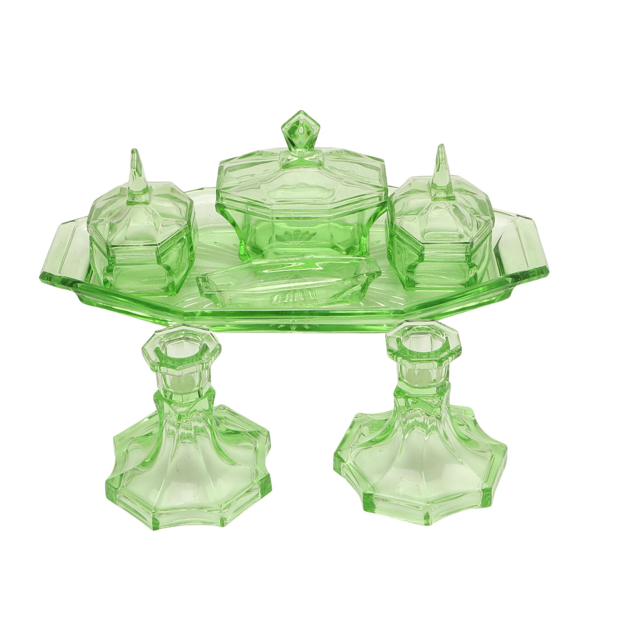 AN ART DECO GREEN GLASS DRESSING TABLE SET.