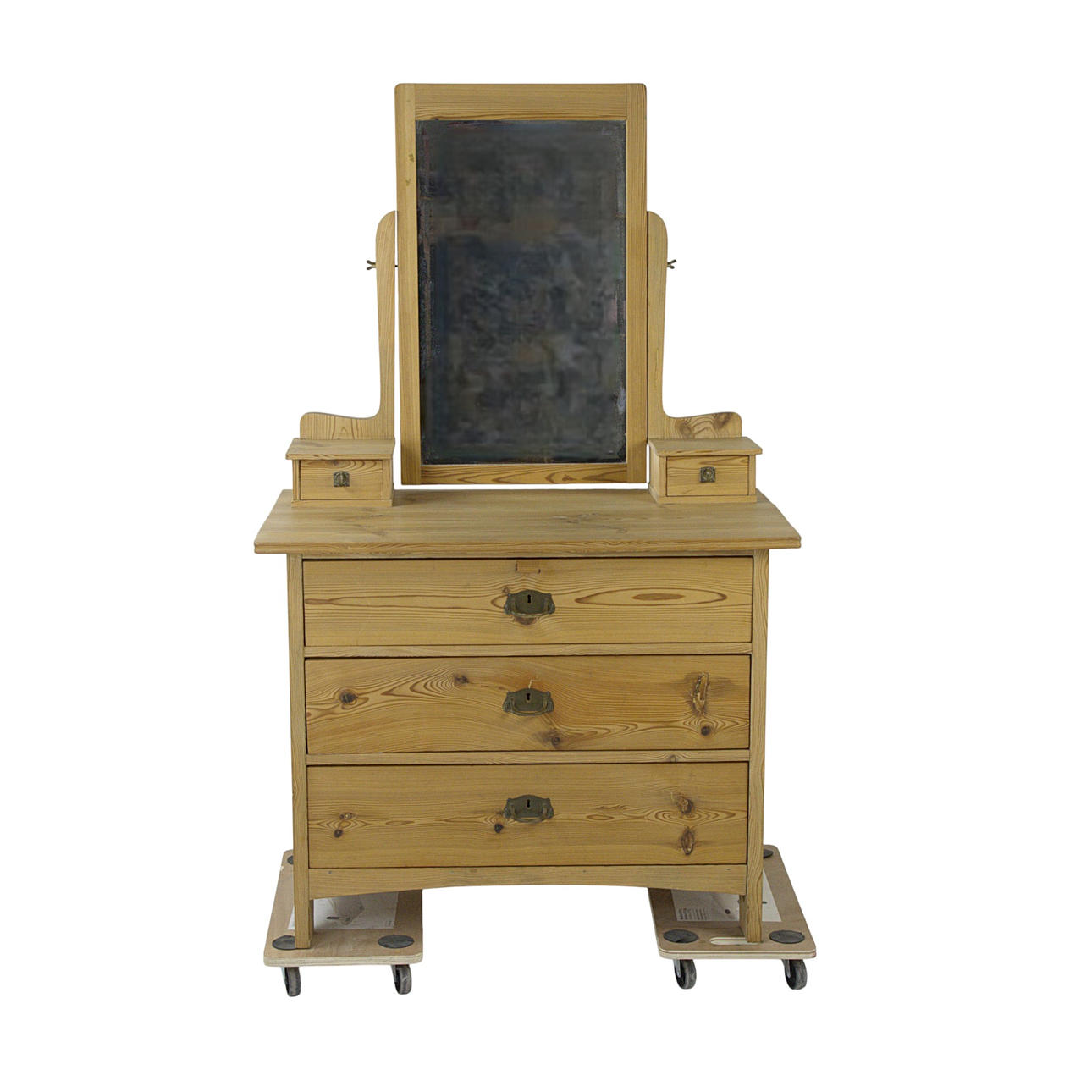 A 20th century tilted pine mirror chest.