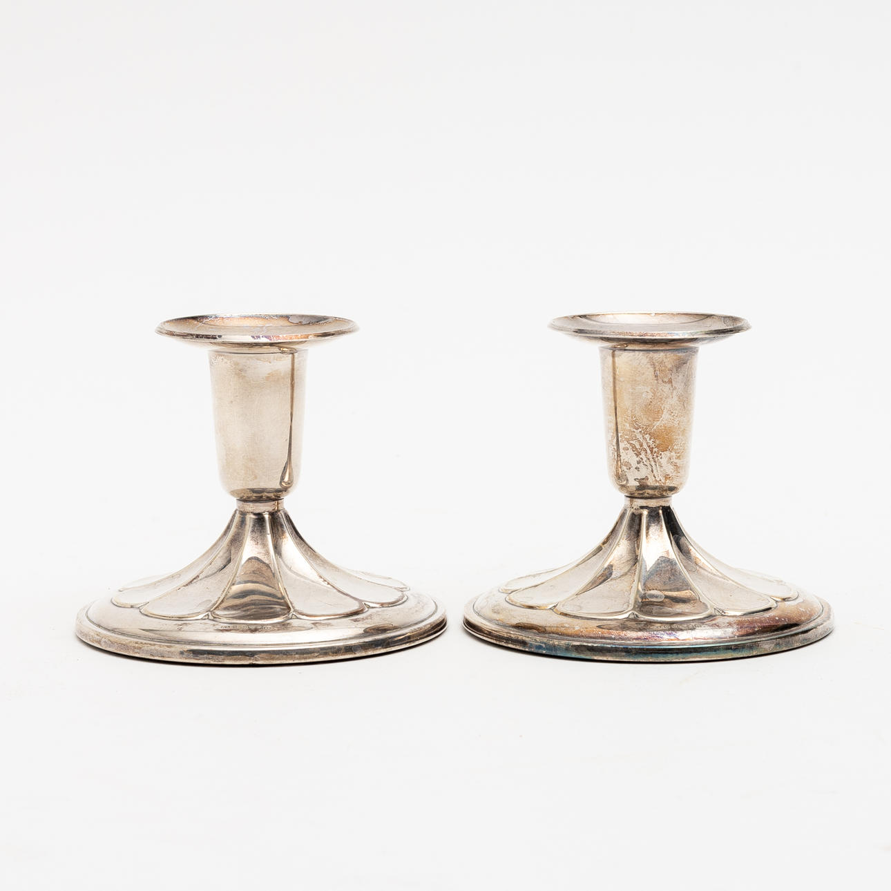 A pair of K&EC silver 1968 candlesticks.