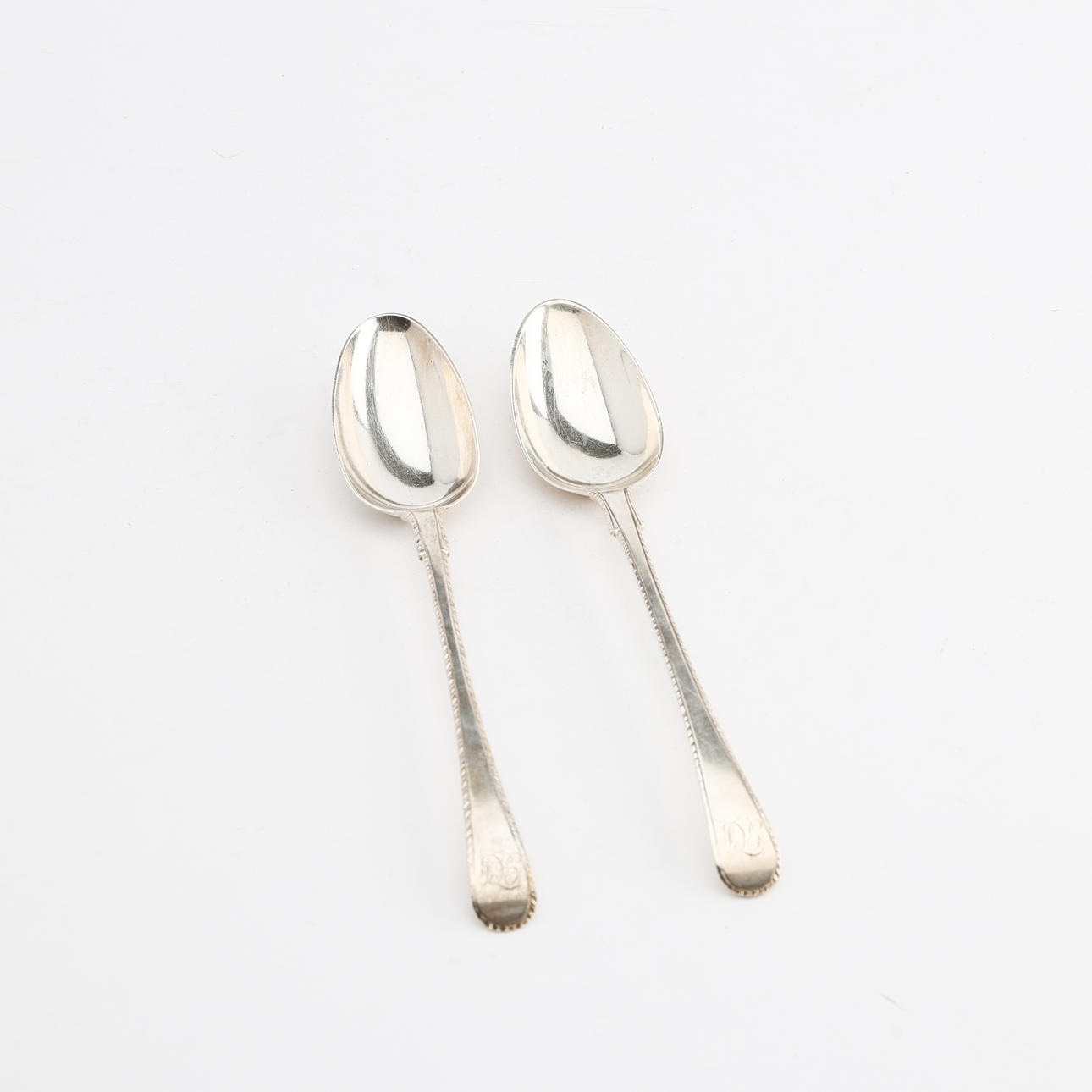 A set of two spoons, including Thomas Chawner, London, 1777.