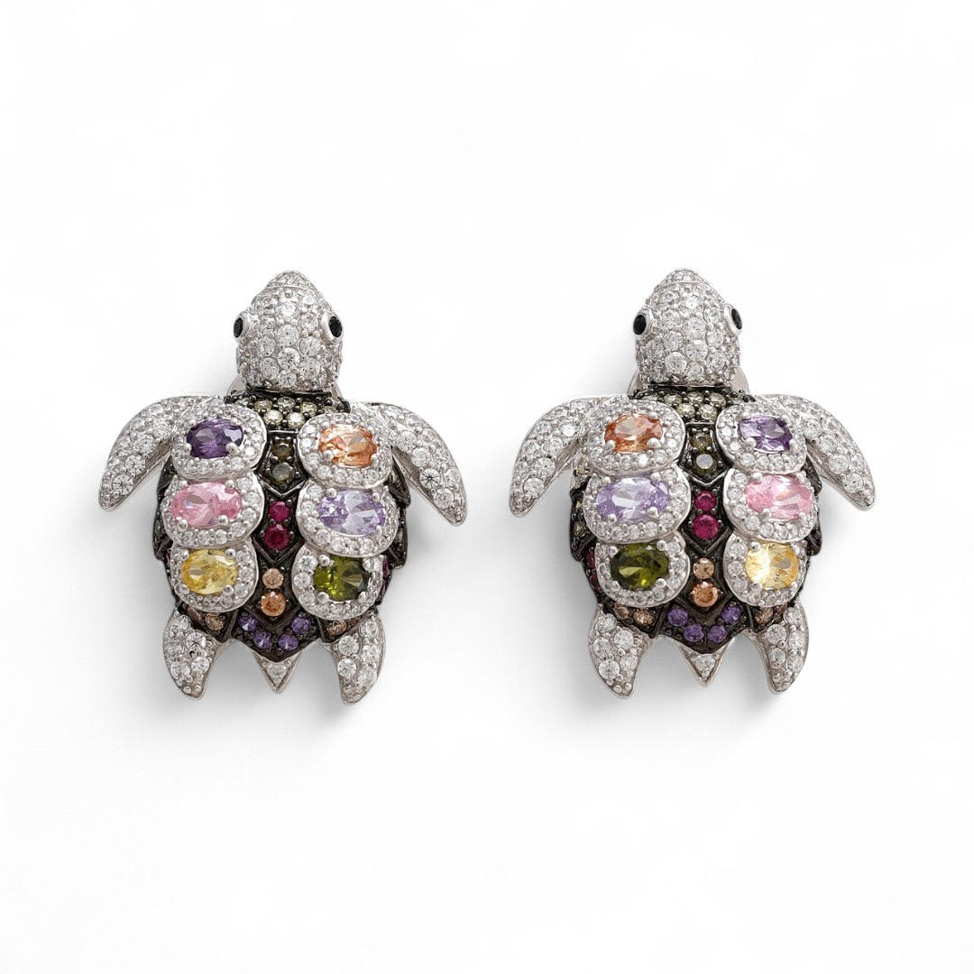 Turtle-shaped earrings.