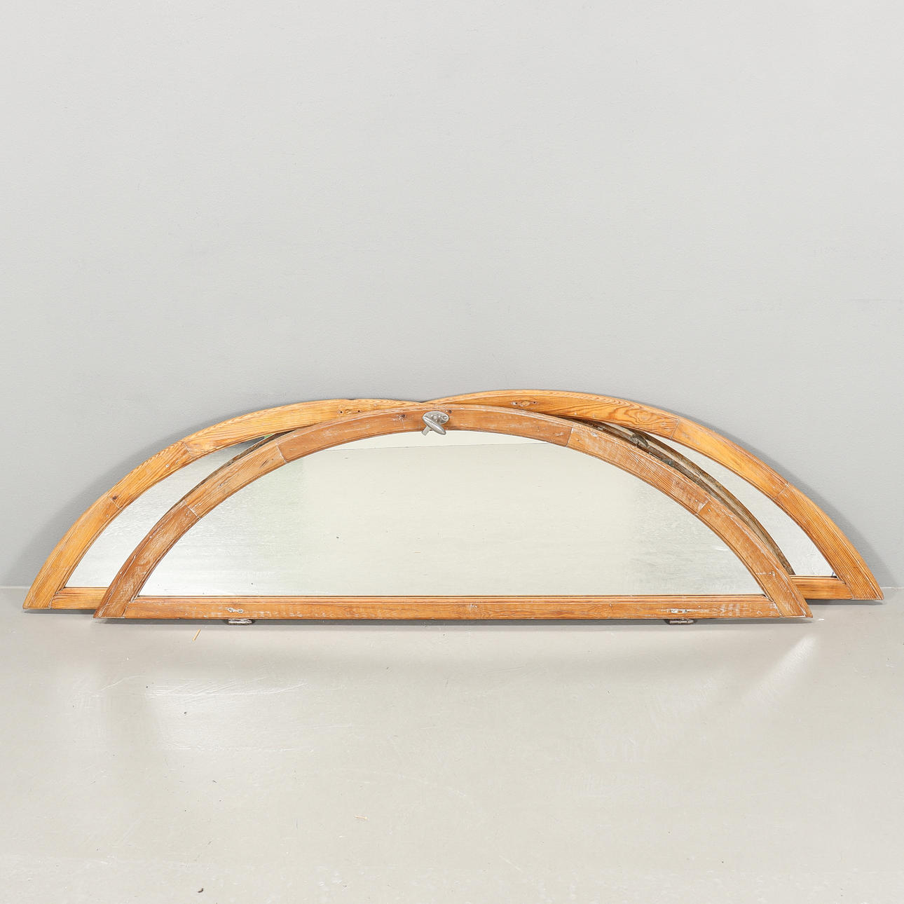 Three mirrors and arched windows, mid 20th century.